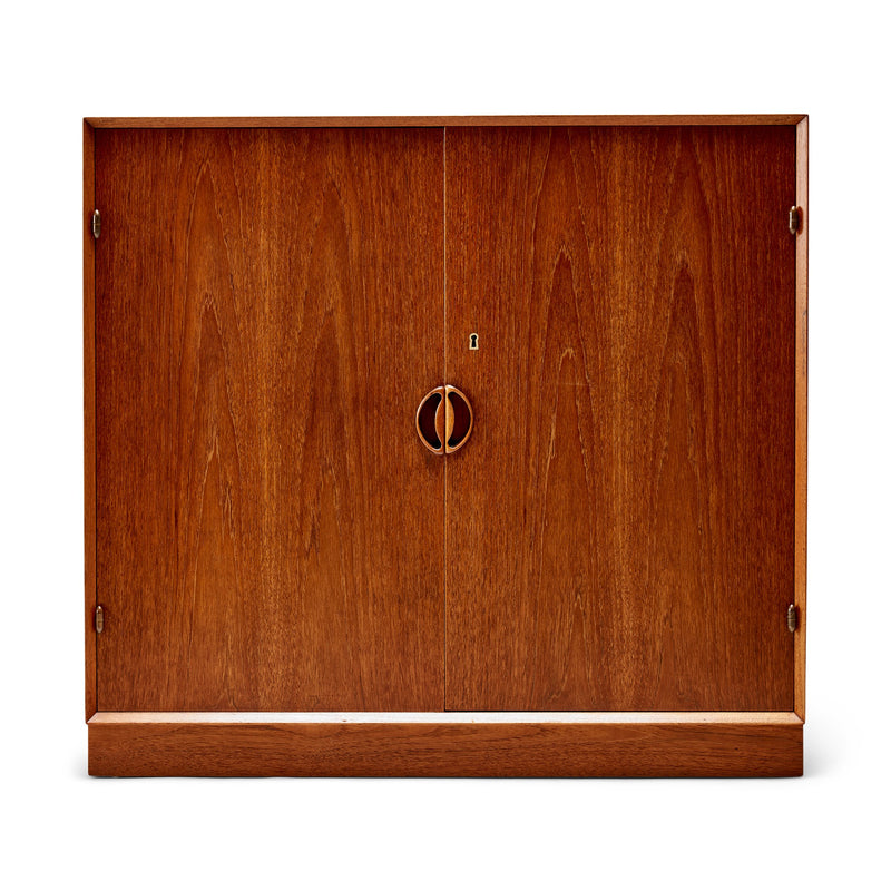 A Solid Teak Two Door Storage Cabinet by Peter Hvidt & Orla Mölgaard-Nielsen - WYETH